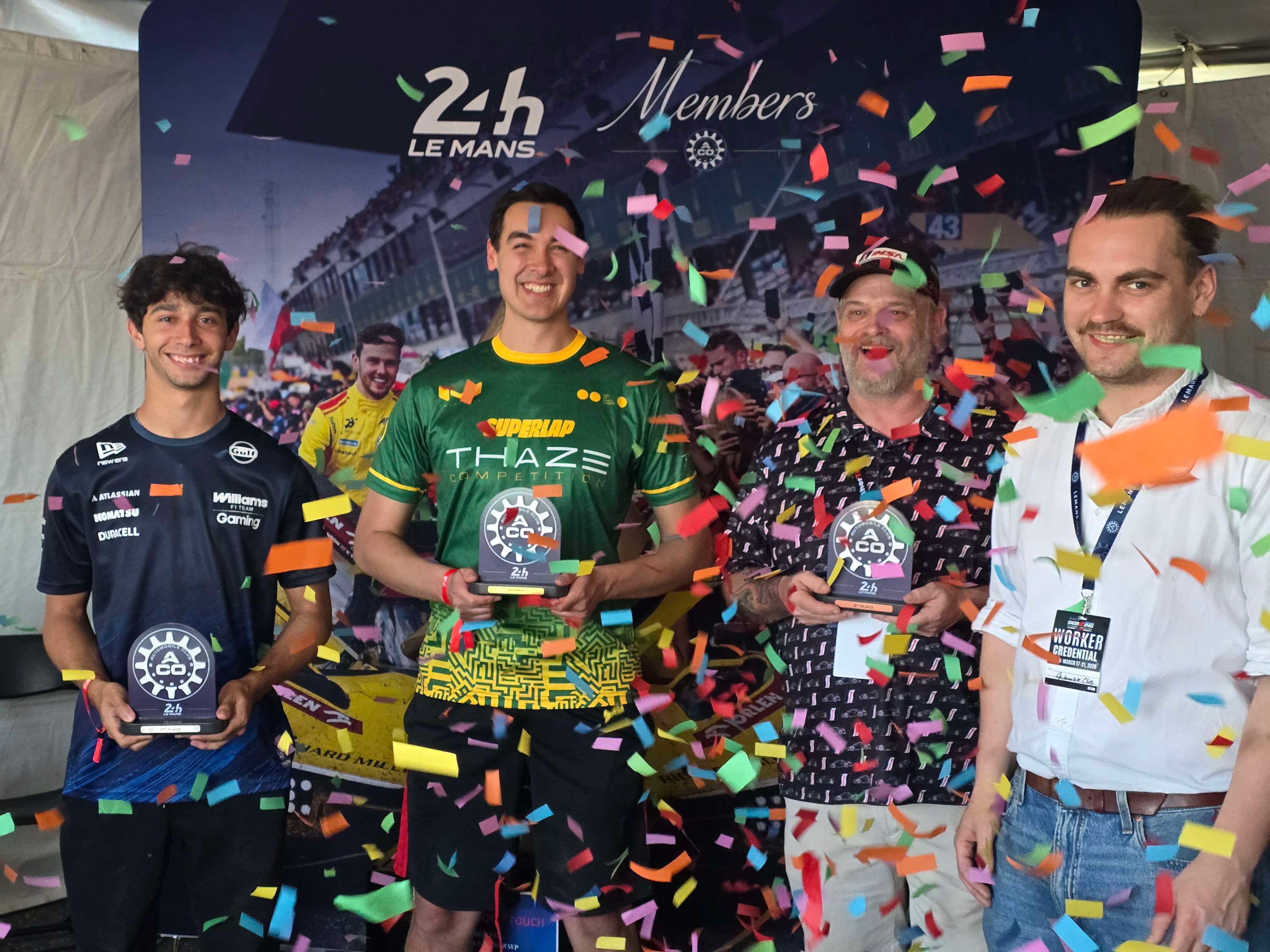 Sim racing winners celebrating after a structured competition